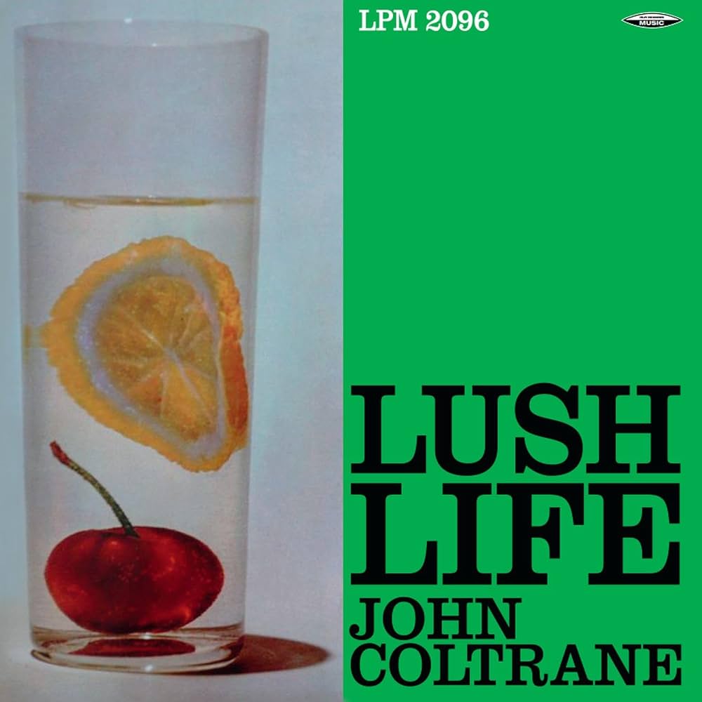 Copertina John Coltrane Lush Life SAAR - sfondo verde con bicchiere contenente fetta di limone e ciliegia rossa, scritta Lush Life John Coltrane in nero, catalogo LPM 2096