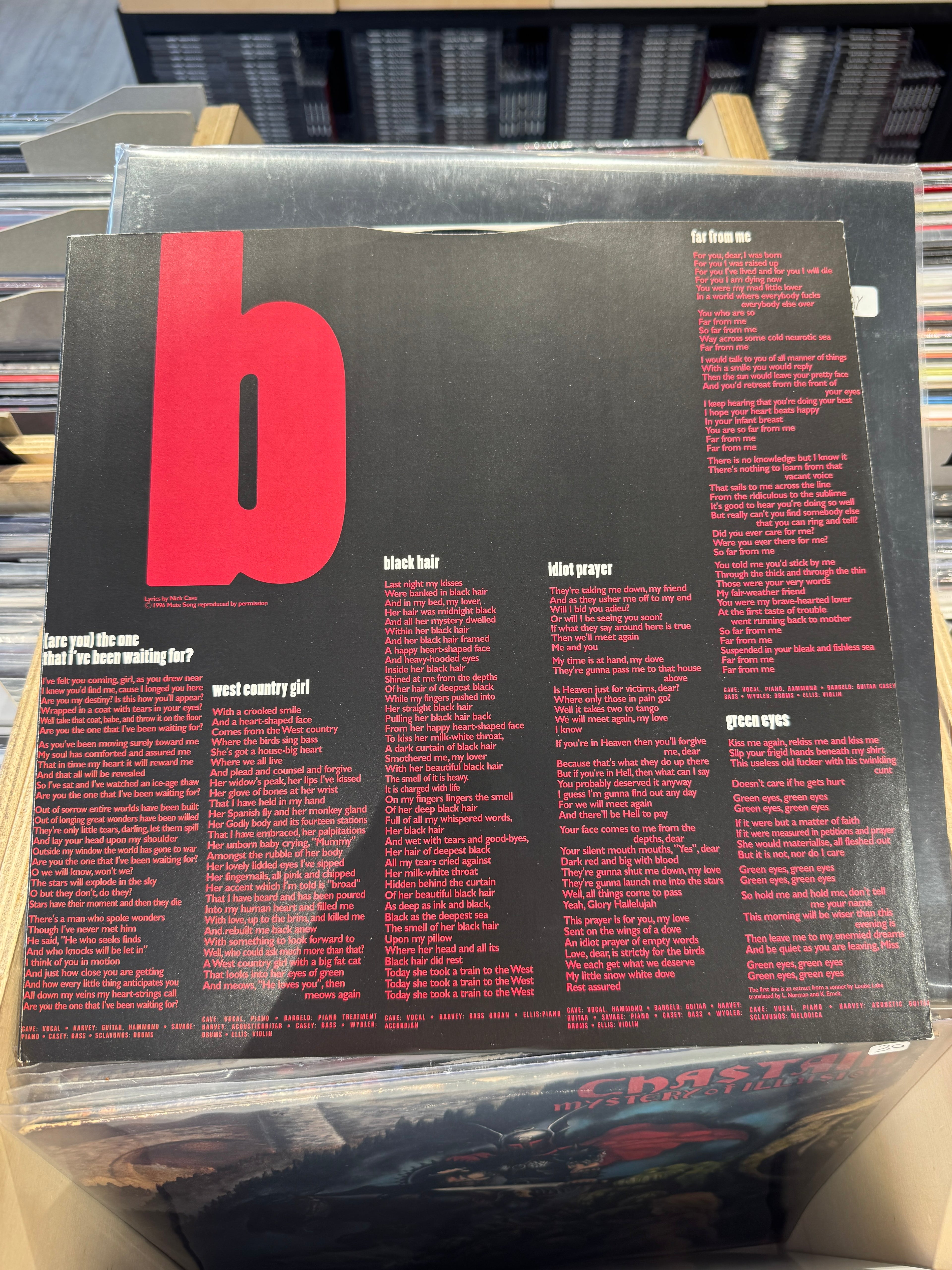Nick Cave & The Bad Seeds – The Boatman's Call, inner sleeve Side A: testi completi di Into My Arms, Lime-Tree Arbour, People Ain't No Good, Brompton Oratory, There Is a Kingdom, Where Do We Go Now But Nowhere su sfondo nero